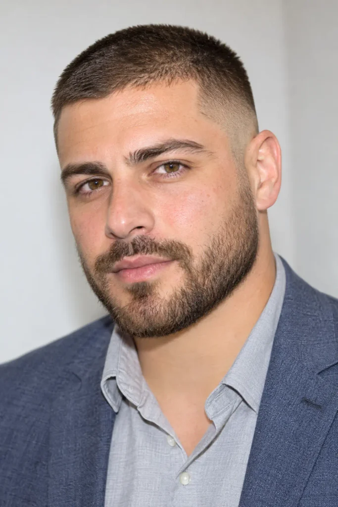 Buzz cut fade with a short beard